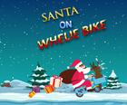 Babbo Natale in bici impennata